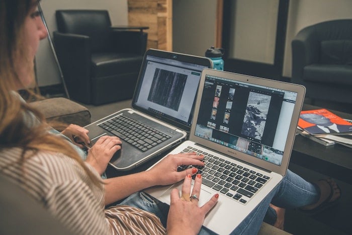 Woman editing images on laptop