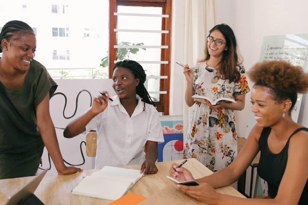 A group of social media marketers laughing in an office