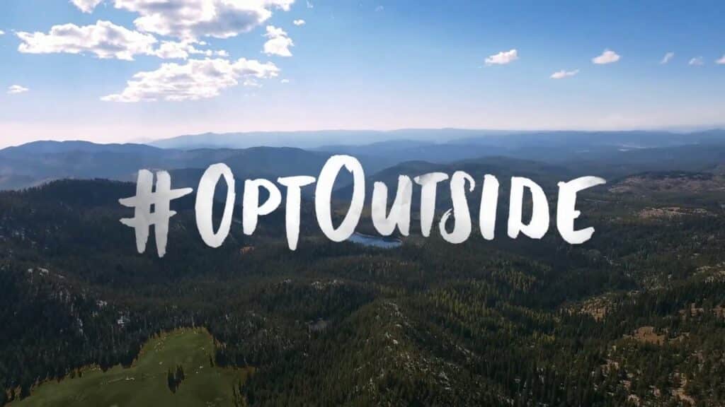 a view of a natural landscape with the hashtag: OptOutside