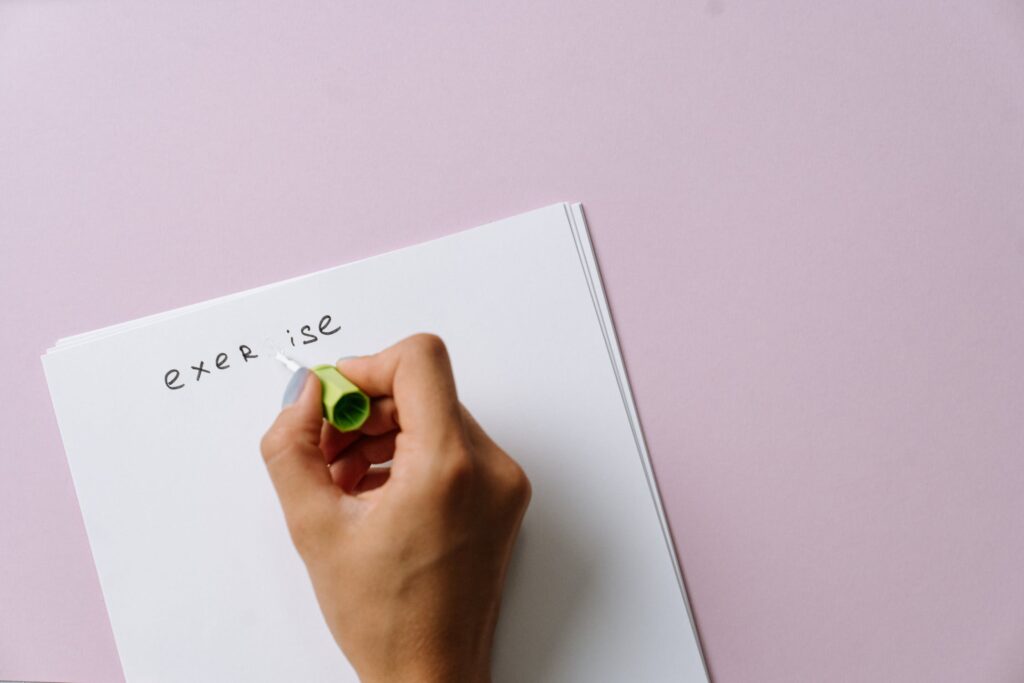 An editor correcting a word written in a notebook