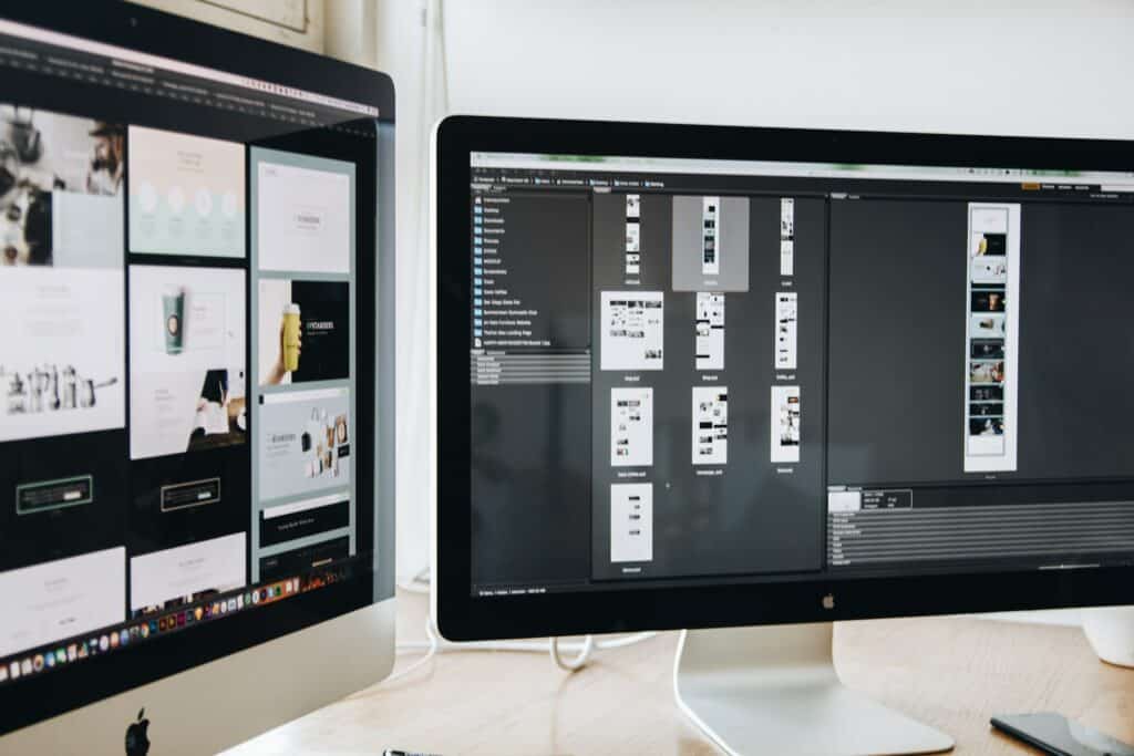 two monitors looking at a design for a multilingual project