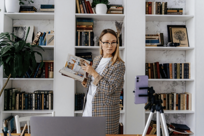 Woman creating a LinkedIn vertical video in her home