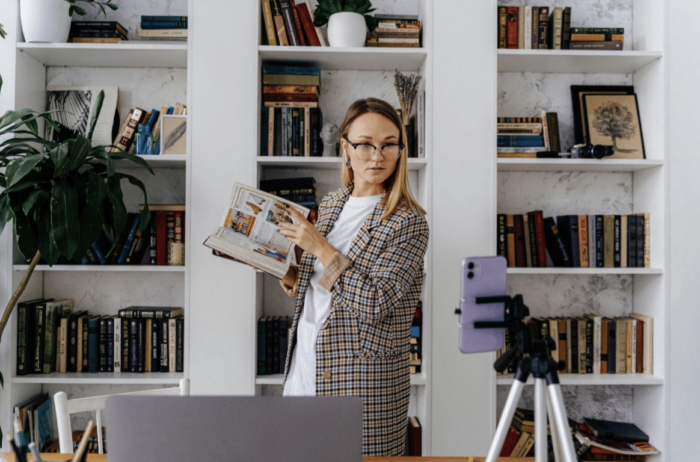Woman creating a LinkedIn vertical video in her home