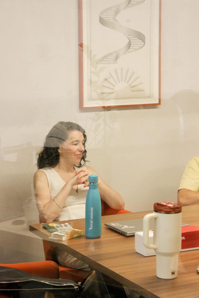 VeraContent team member sitting in a meeting
