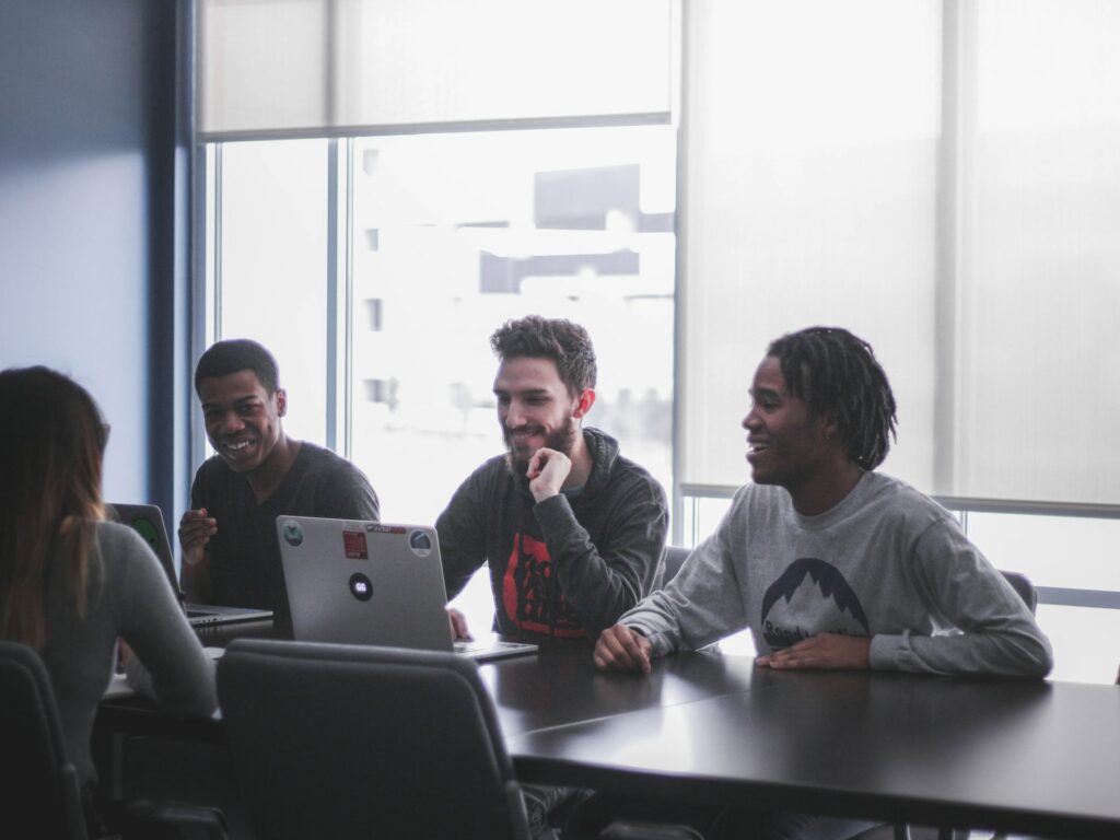 People in an office near computer highlighting the importance of an international SEO strategy