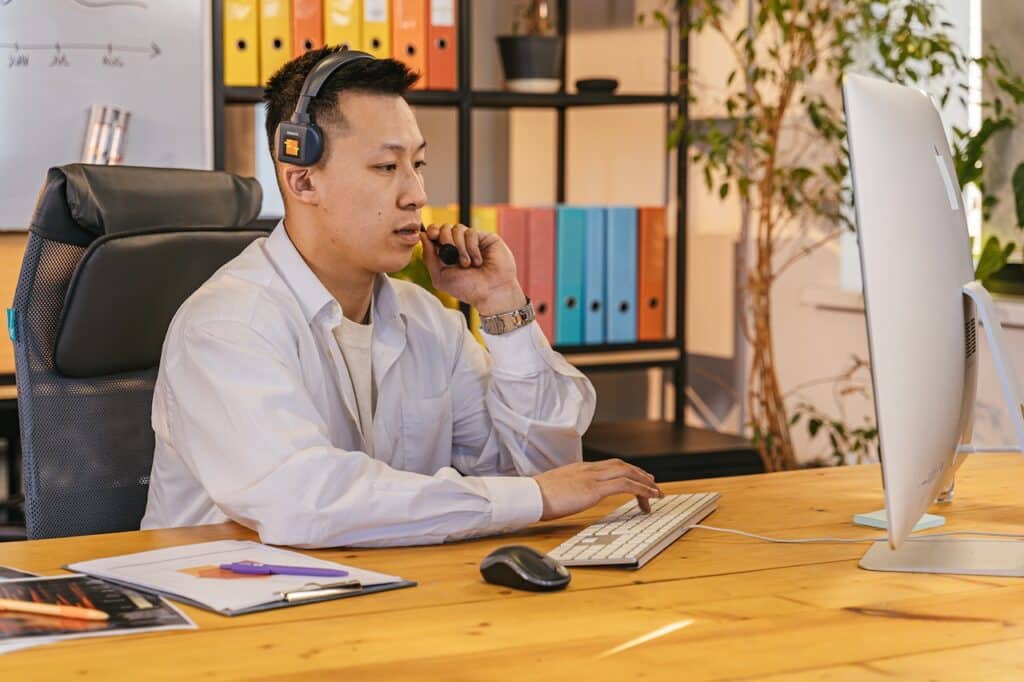 Man working on international SEO keyword research on PC