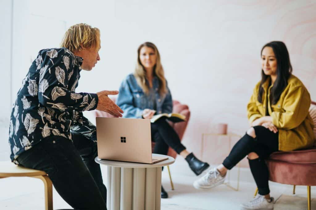 Team discussing consolidating global social media pages
