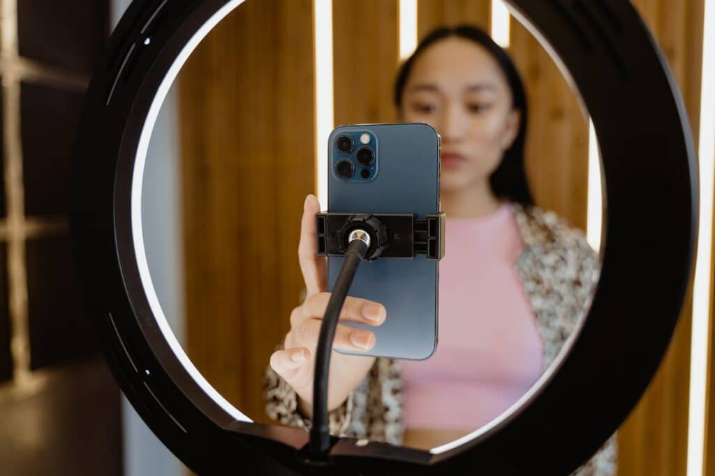 Woman creating user-generated content on her phone 