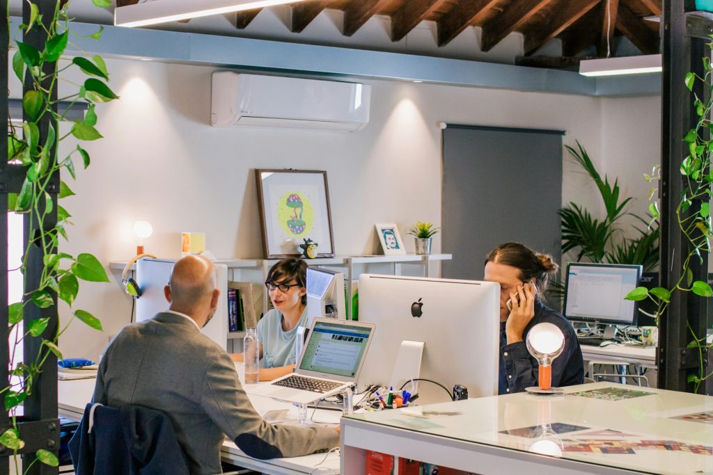 Global social media agency team working in the office